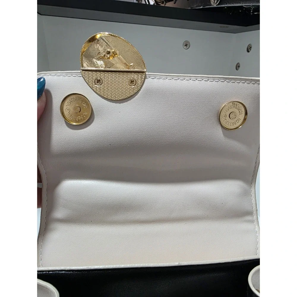 White Structured Top Handle Purse Gold Embroidered Abstract Face Chain Strap Bag